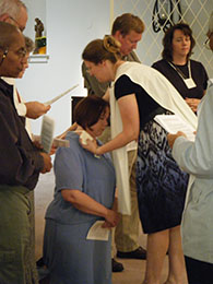 2010 novice Camie T. receives her Dominican scapular.