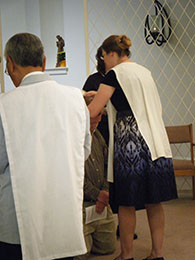 2010 novice Chris J. receives his Dominican scapular.