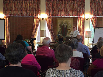 Fr. Carlos Quijano speaks to over 16 members during his September retreat, "A Reason for your Hope."