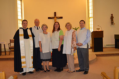 Four new permanent members with the regional president and Fr. Thomas Petri, O.P., at the regional retreat.